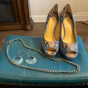 Women’s snake skin peep toe heels, earrings, and necklace